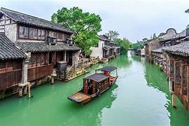 Cảm nhận vẻ đẹp cổ kính của vùng Giang Nam qua những mái ngói rêu phong, dòng kênh xanh và nhịp sống bình yên